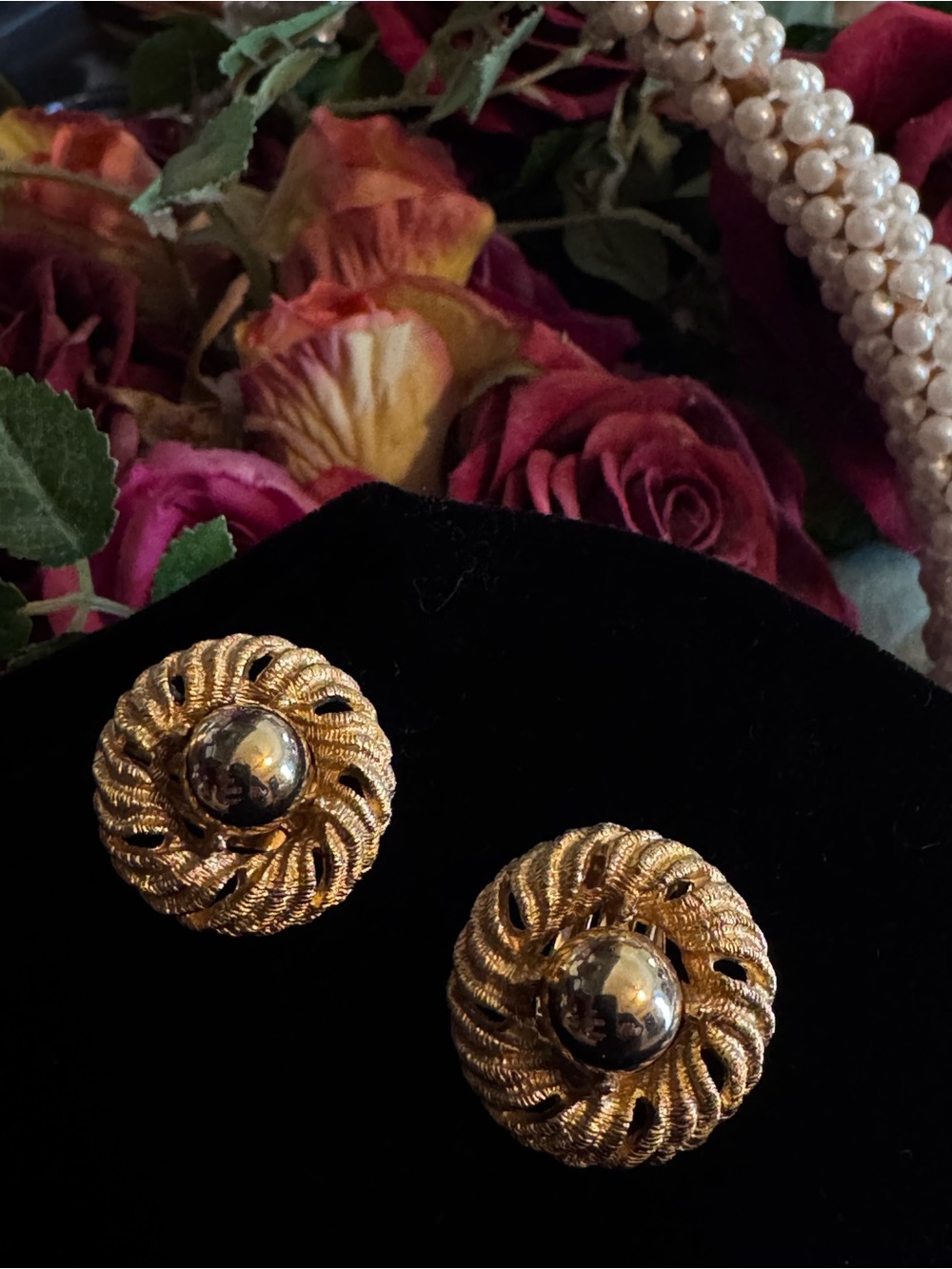 Vintage Clip-on Earrings
Gold-tone Swirl Design with Polished Center Dome.
